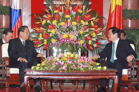 张晋创主席会见老挝国家主席 